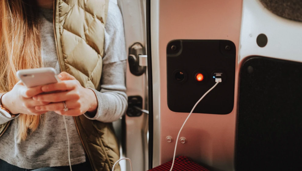 A 12V outlet and dual USBs just inside the double rear doors provide for device charging