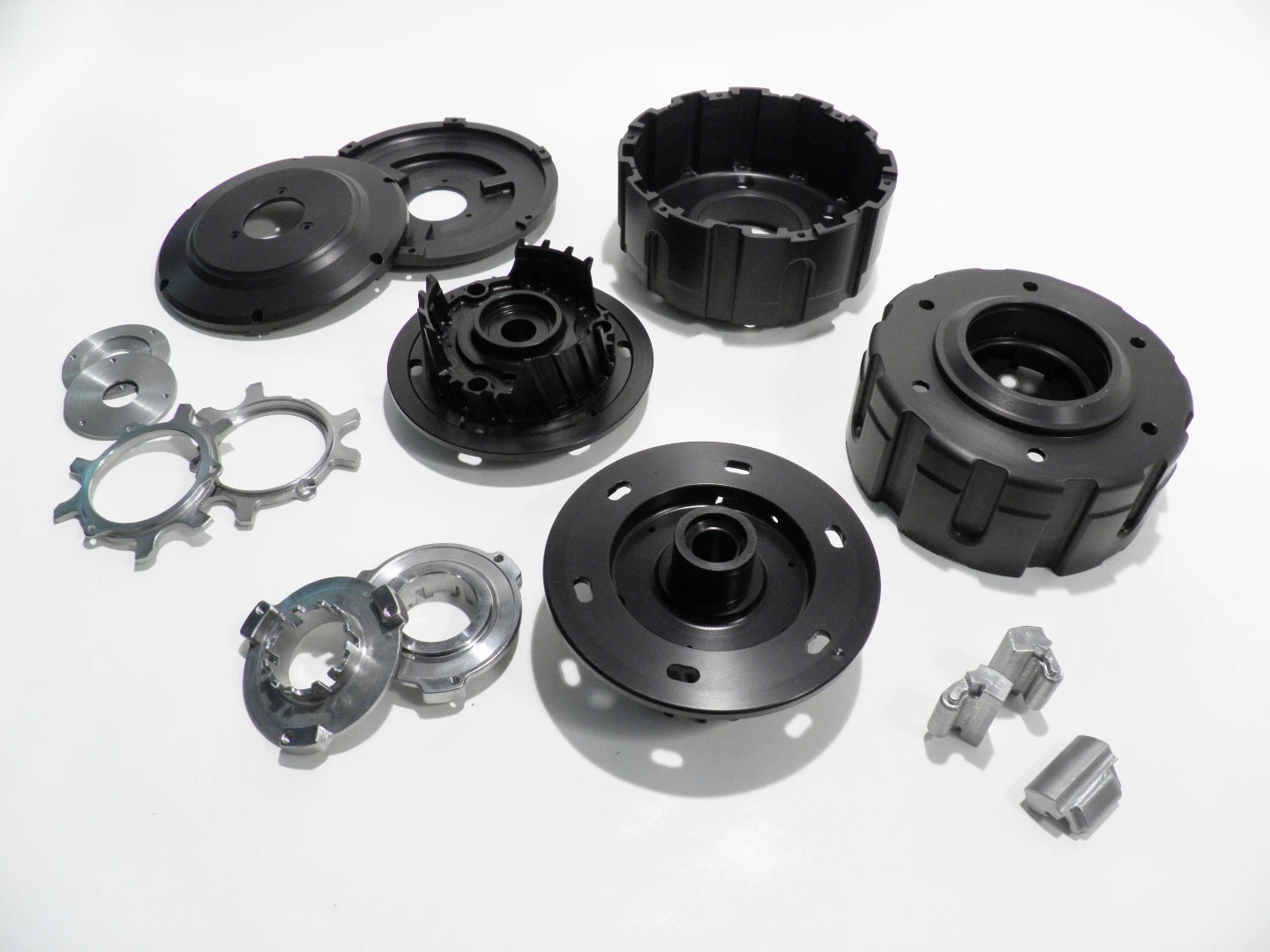 Various pieces that make up the automatic clutch of the Shift FX EST system