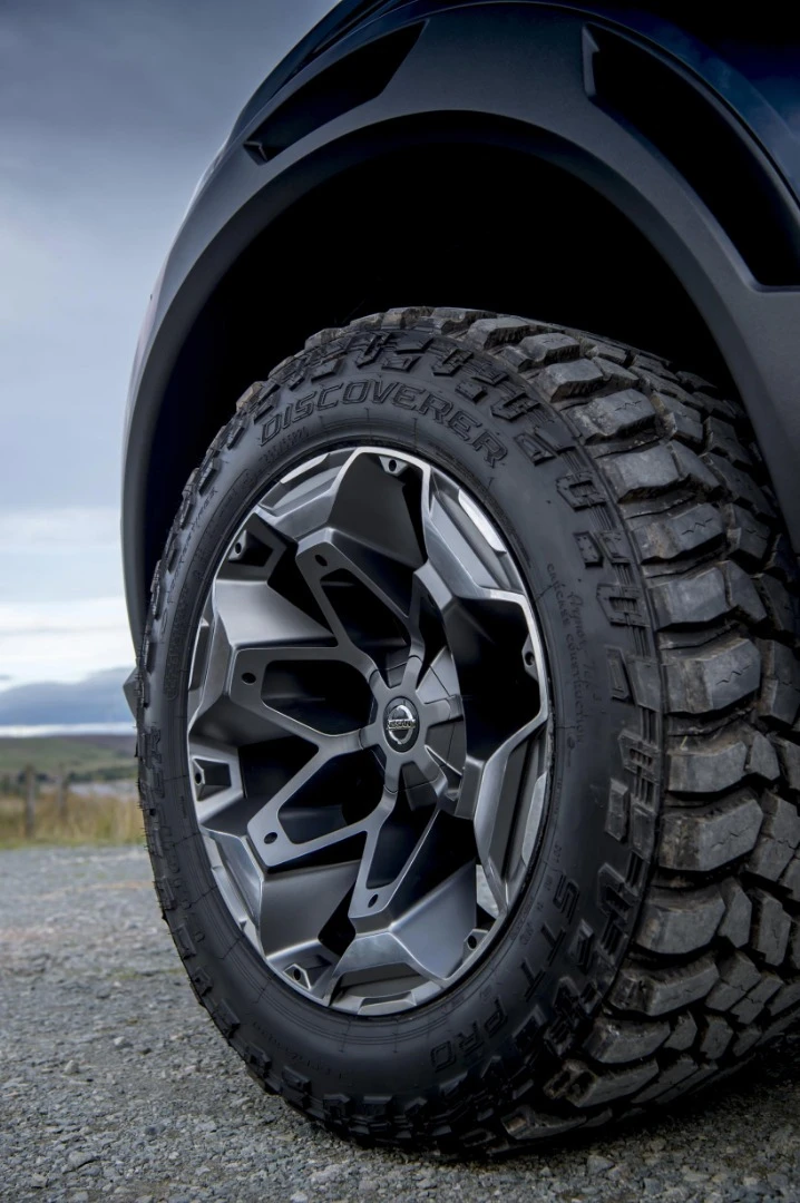 The Navara rolls on 20-in wheels with off-road tires, while the trailer rolls on 16-in wheels
