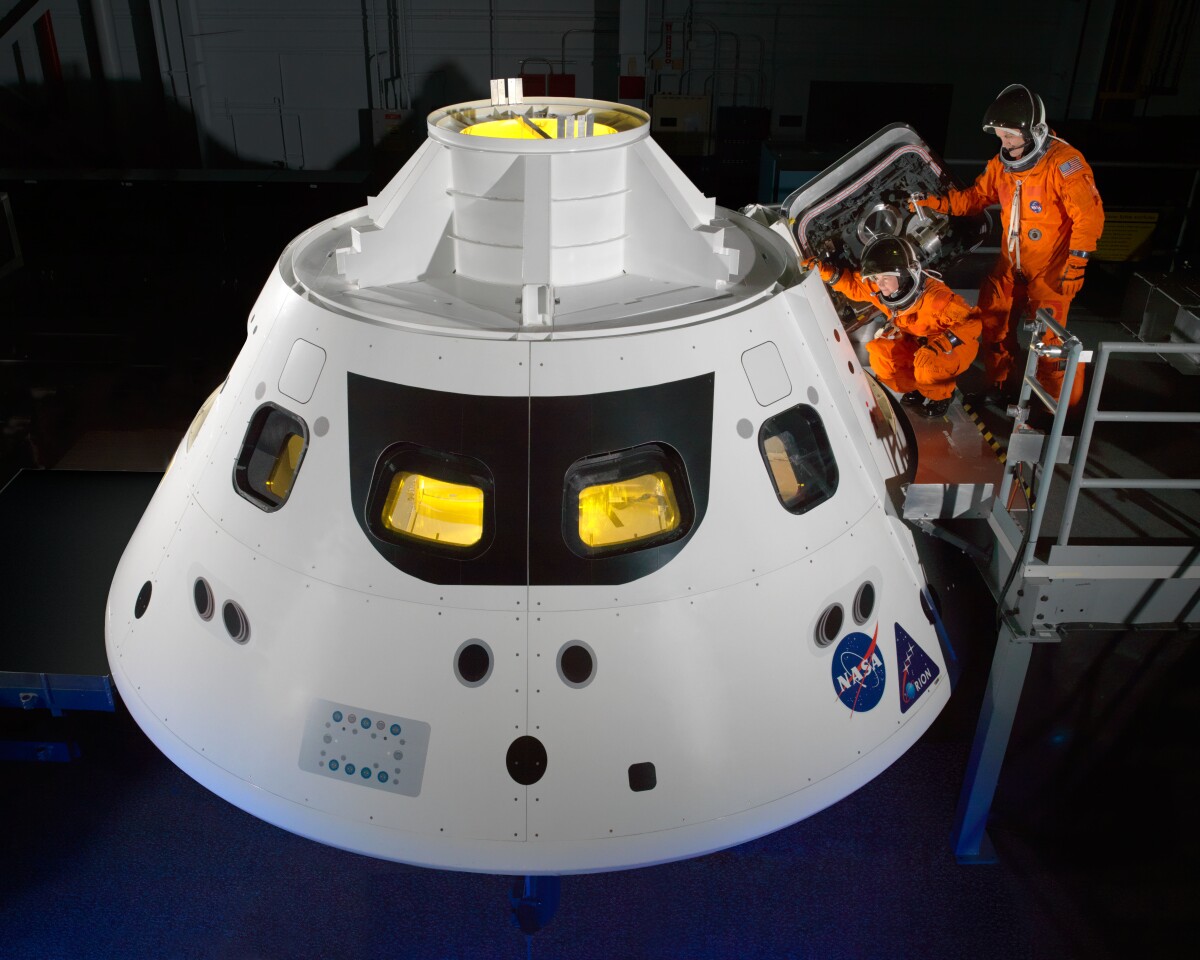 ACES suit being used on mock up the Orion (Image: NASA)