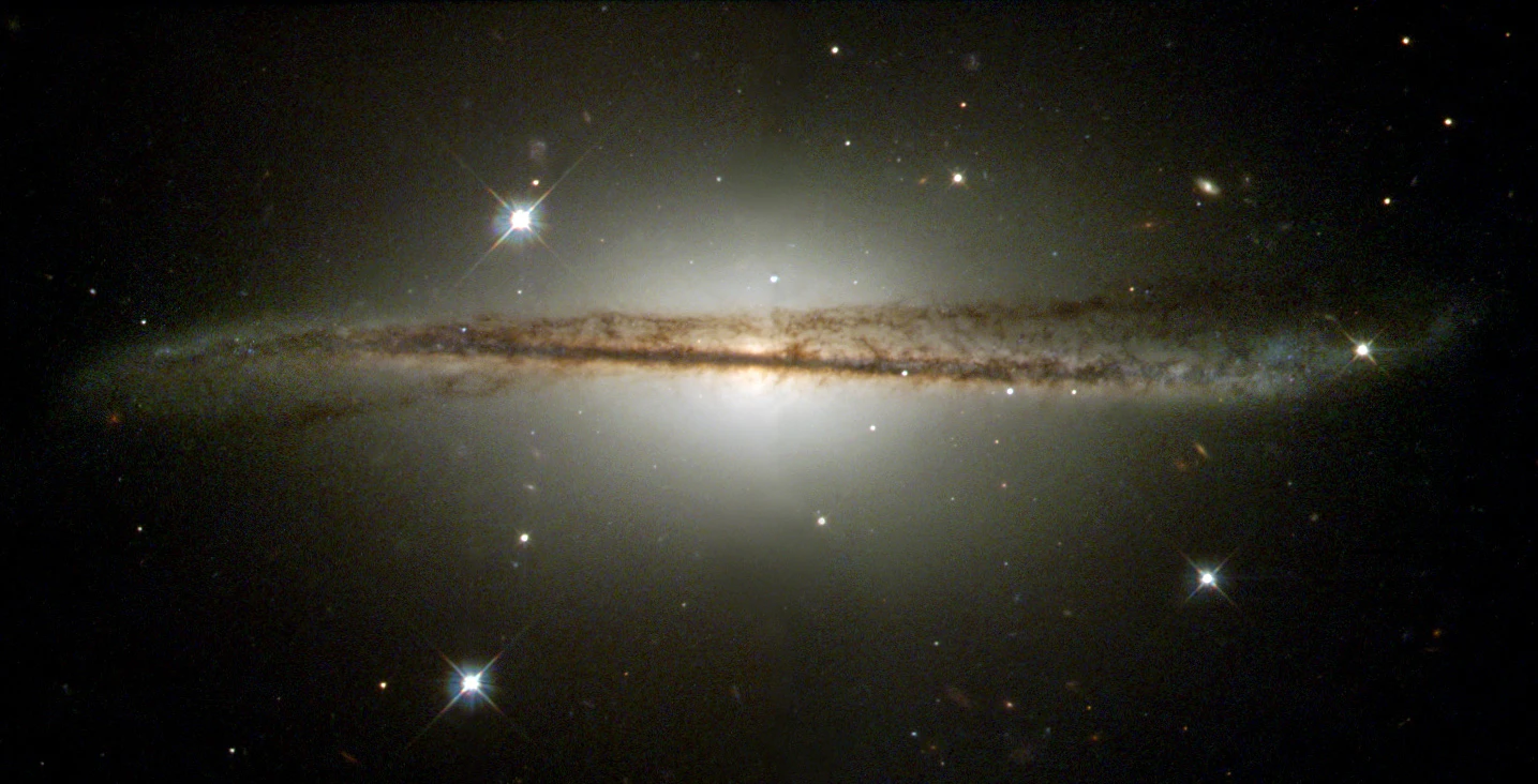 This Hubble Heritage image of ESO 510-G13 shows a galaxy that, by contrast, has an unusual twisted disk structure, first seen in ground-based photographs