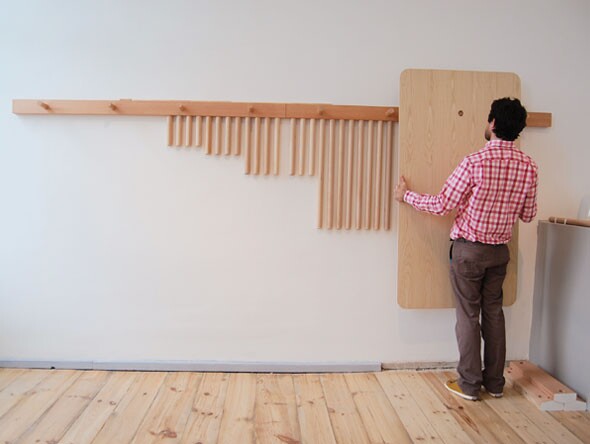 Hanging the spare Wood Peg furniture components on the wall makes storage simple