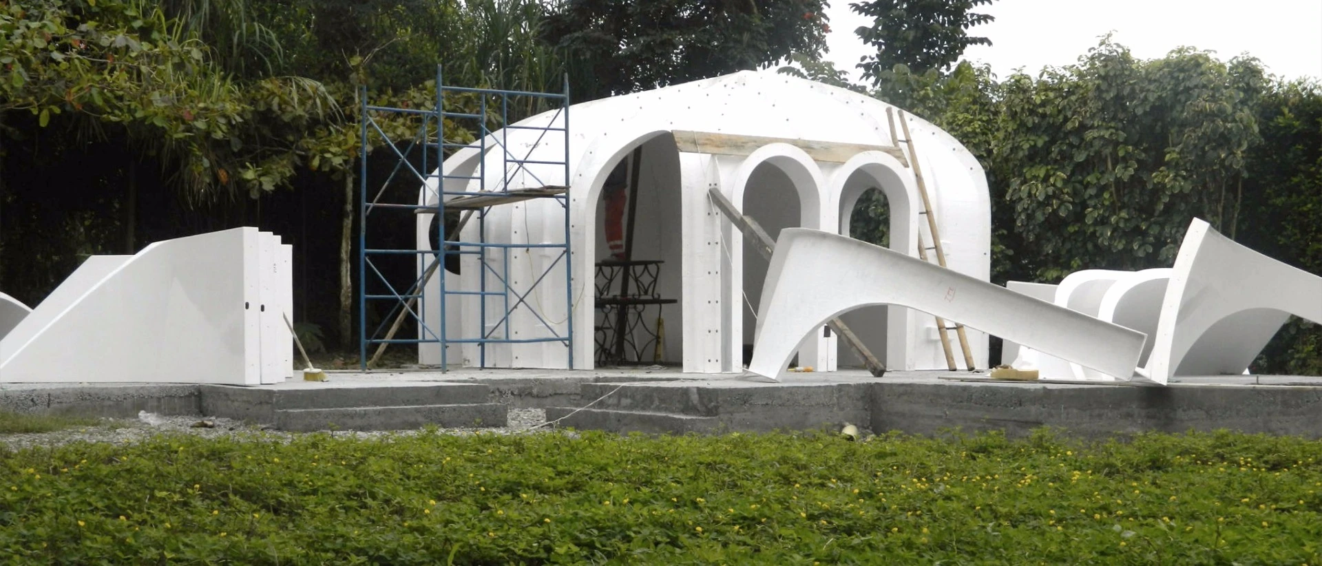 Each Green Magic Home kit includes aluminum doors and windows, along with some fiber cement board components which are joined to the FRP sections using nylon ties and then sealed with an elastomer