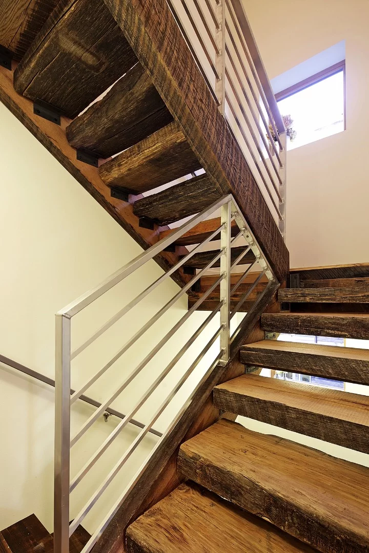 Floors, stairs, and treads were built out of 100-year-old hand-sewn mixed hardwoods