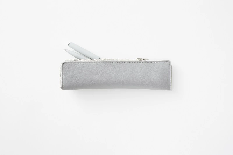 The pencil case peels back to open