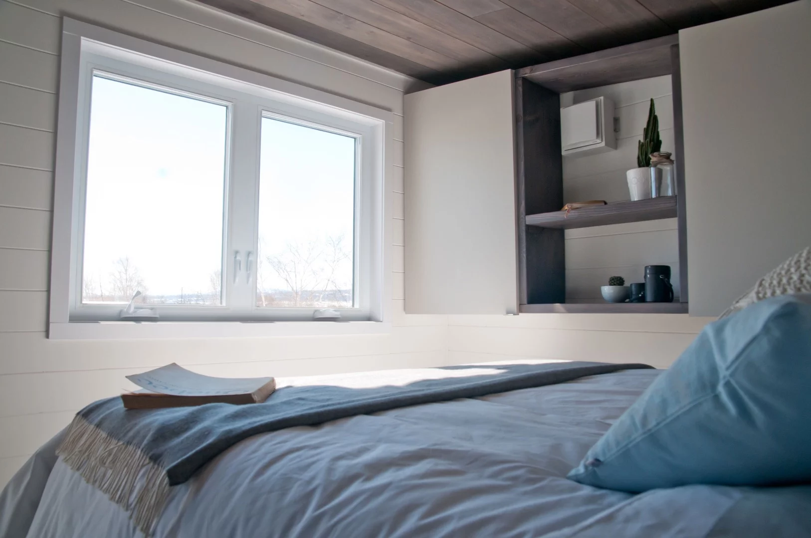 The Sakura's bedroom is pretty spacious for a tiny house and has plenty of headroom to stand up straight