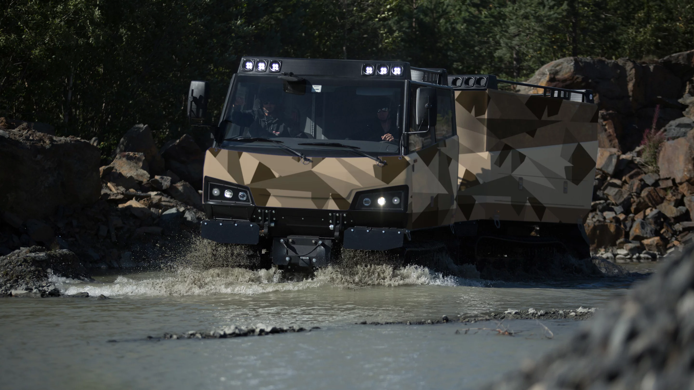 Beowulf is an unarmored, tracked, and highly versatile vehicle for carrying personnel and payloads in either of its two compartments across the most challenging terrains