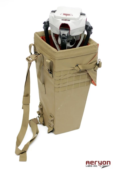 When folded, the quadcopter's appendages protect its camera or payload and allow it to slip into an accompanying backpack for quick access later