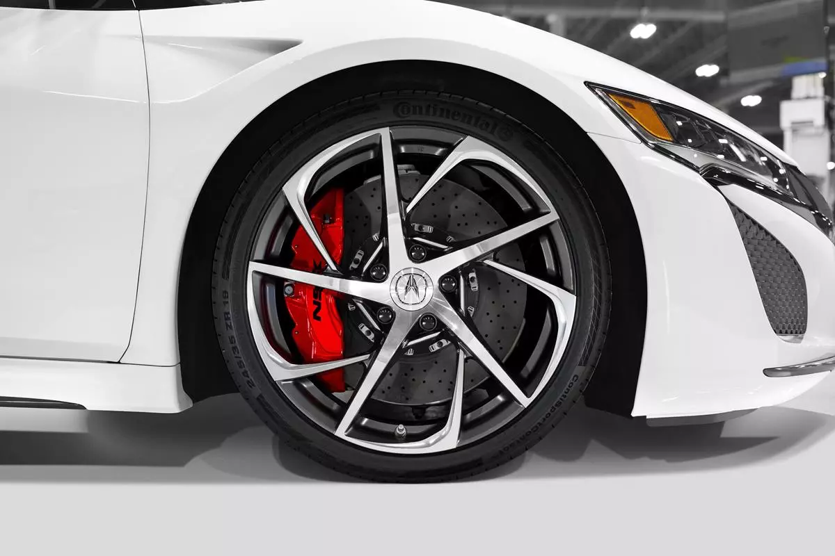 Acura has released technical details about the hybrid sports car, including its all-wheel drive platform and planned production for the 2017 model year