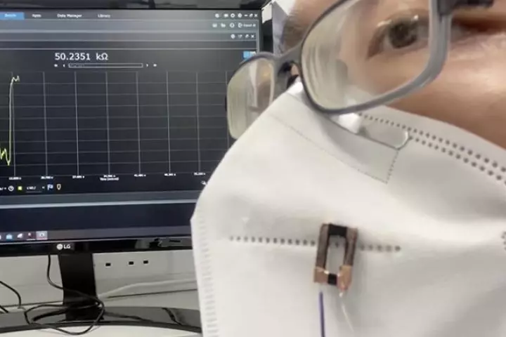 Scientists have developed a 3D-printed fiber than can be used to track breathing through face masks