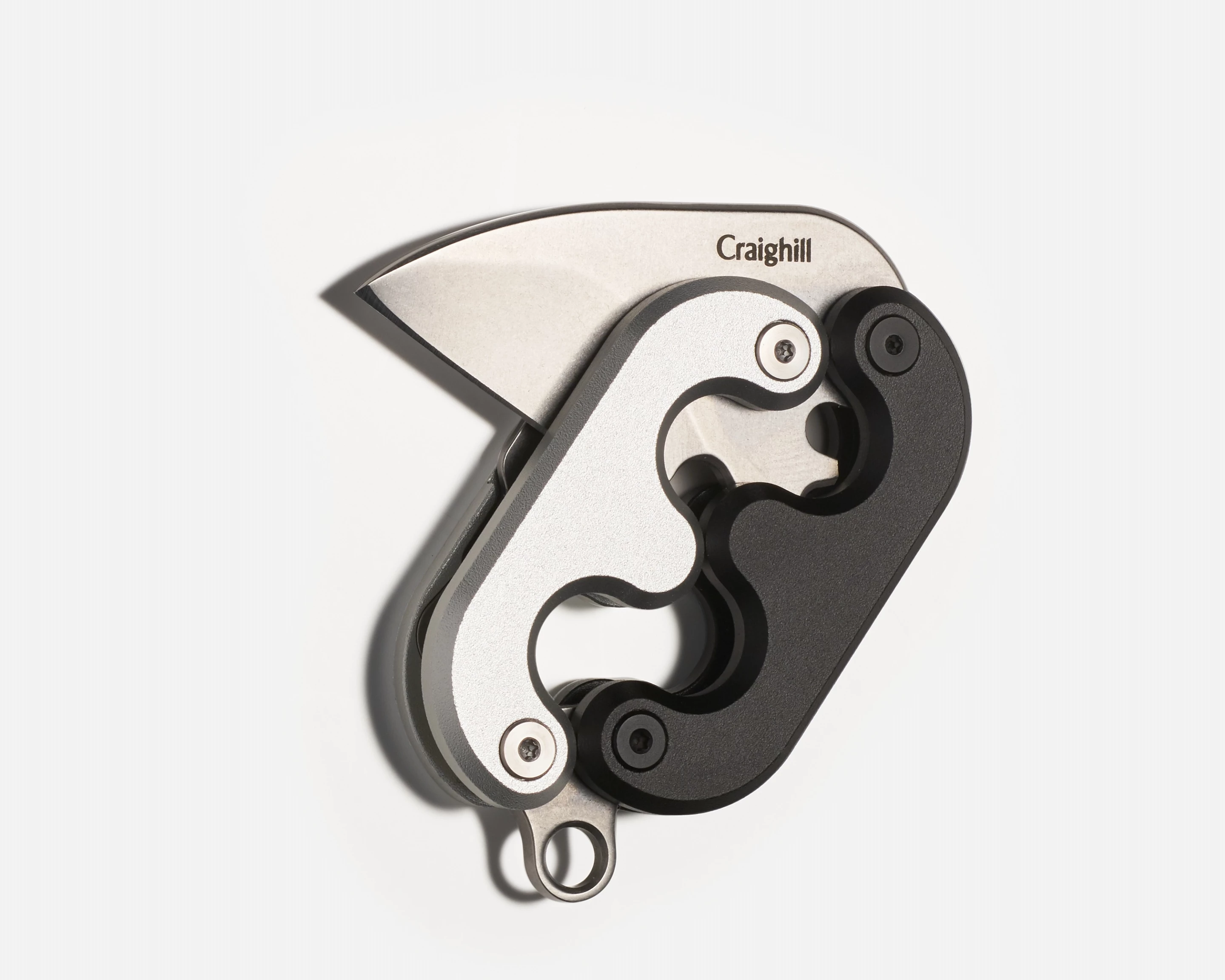 A tiny nugget of a knife with a unique unfurling mechanism