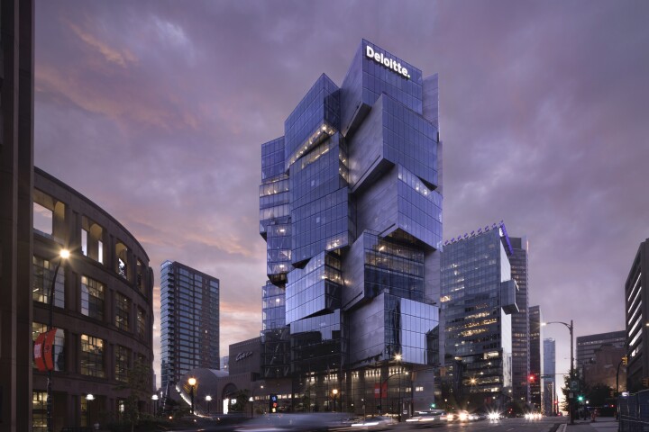 The recently completed Deloitte Summit takes the form of a collection of stacked glass cubes in Vancouver, Canada