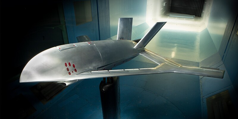 A series of nozzles along the wing spray compressed air to alter aerodynamics as needed