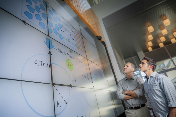Miroslav Krstic (left) and UC President's Postdoctoral Fellow Scott Moura have developed estimation and control algorithms that improve the efficiency of lithium-ion batteries (Photo: Jacobs School of Engineering)