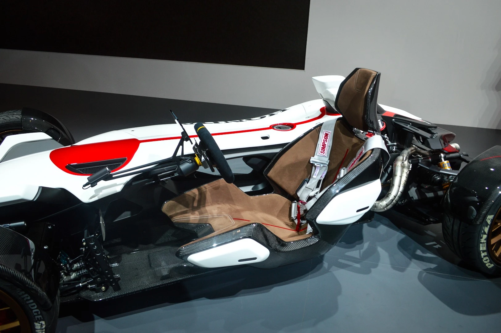 The 2&4's single seat is set low, providing a closer connection to the road below
