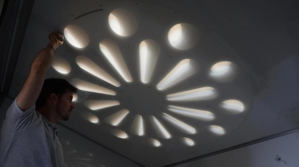 The rose window adjusts from fully open to fully closed, altering the amount of sunlight in the bedroom