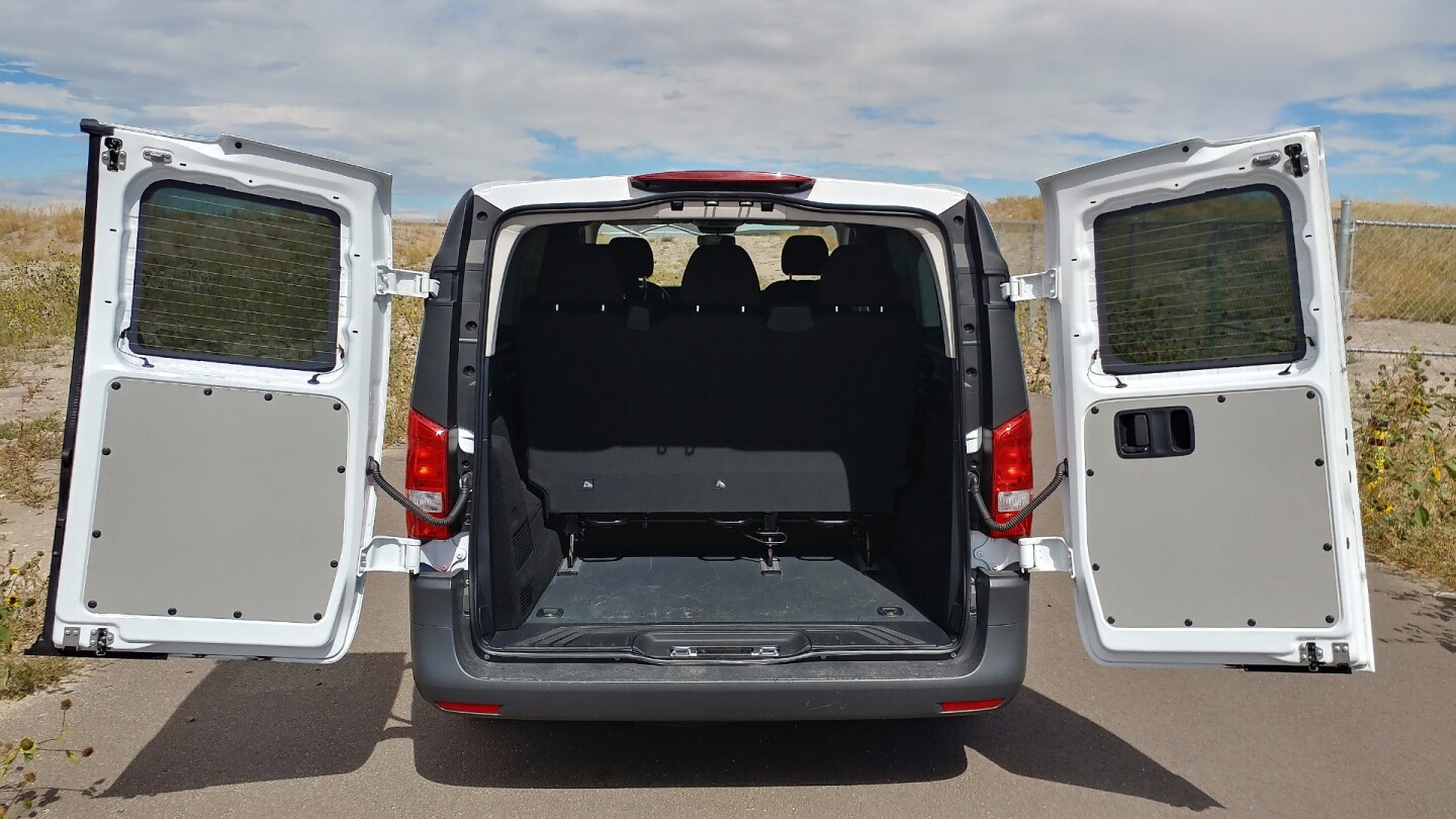 We note that on the Metris Passenger, the rear doors hing out to only 180 degrees versus the 270-degree double-hinge that's standard on the Cargo versions of the van