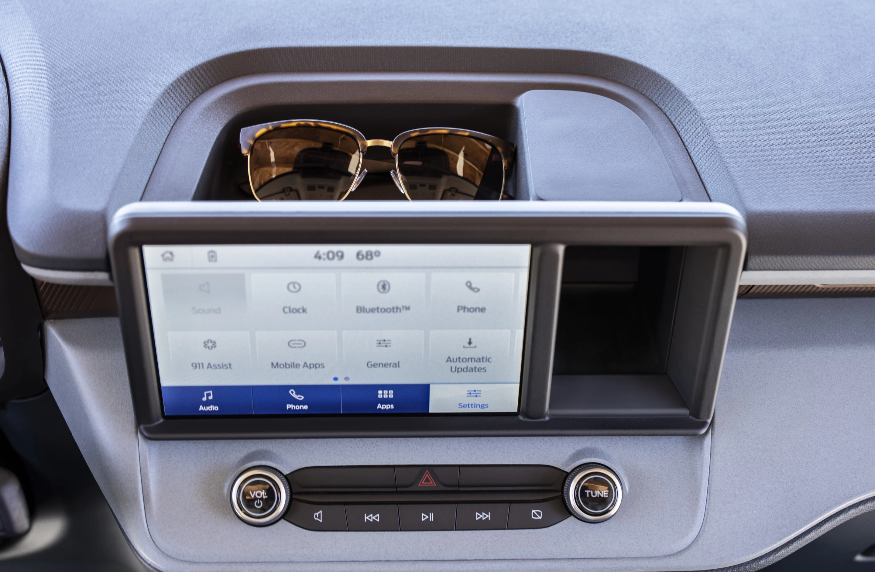 Creative storage areas, like the spot behind and next to the touchscreen, are found throughout the Ford Maverick's interior