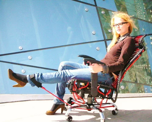 The leg muscles get a workout too, with straps from the bottom of the chair connected to resistance bands