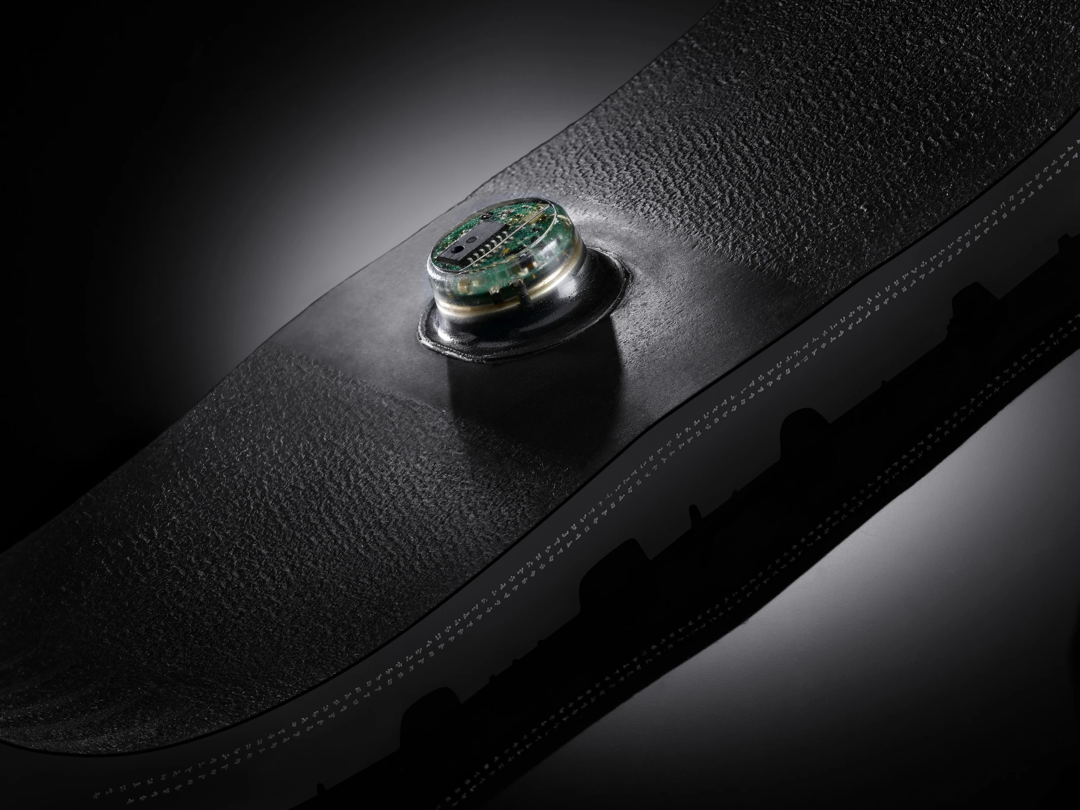 Continental's Tire Pressure Monitoring System is glued to the inner surface of the tire tread