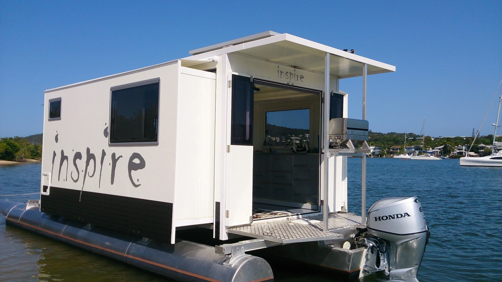 Inspire trailerable houseboat