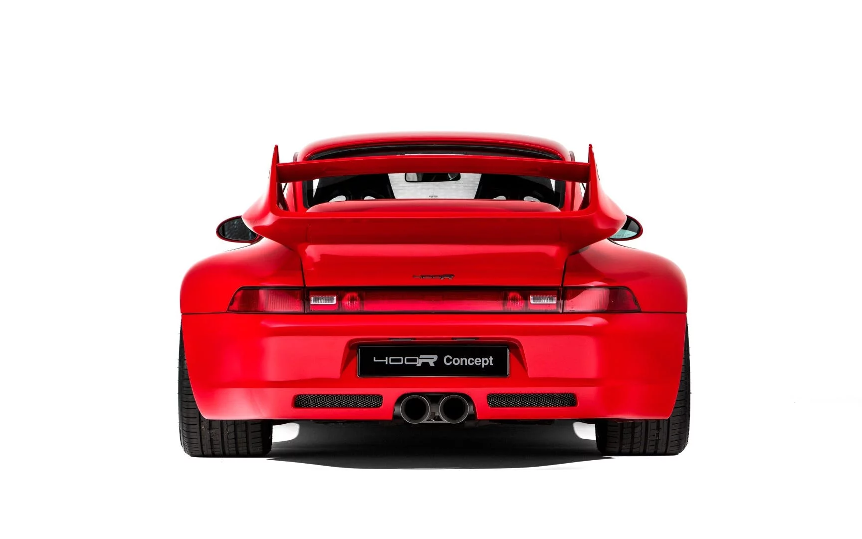 That exhaust system is actually borrowed from a 997 911 GT3