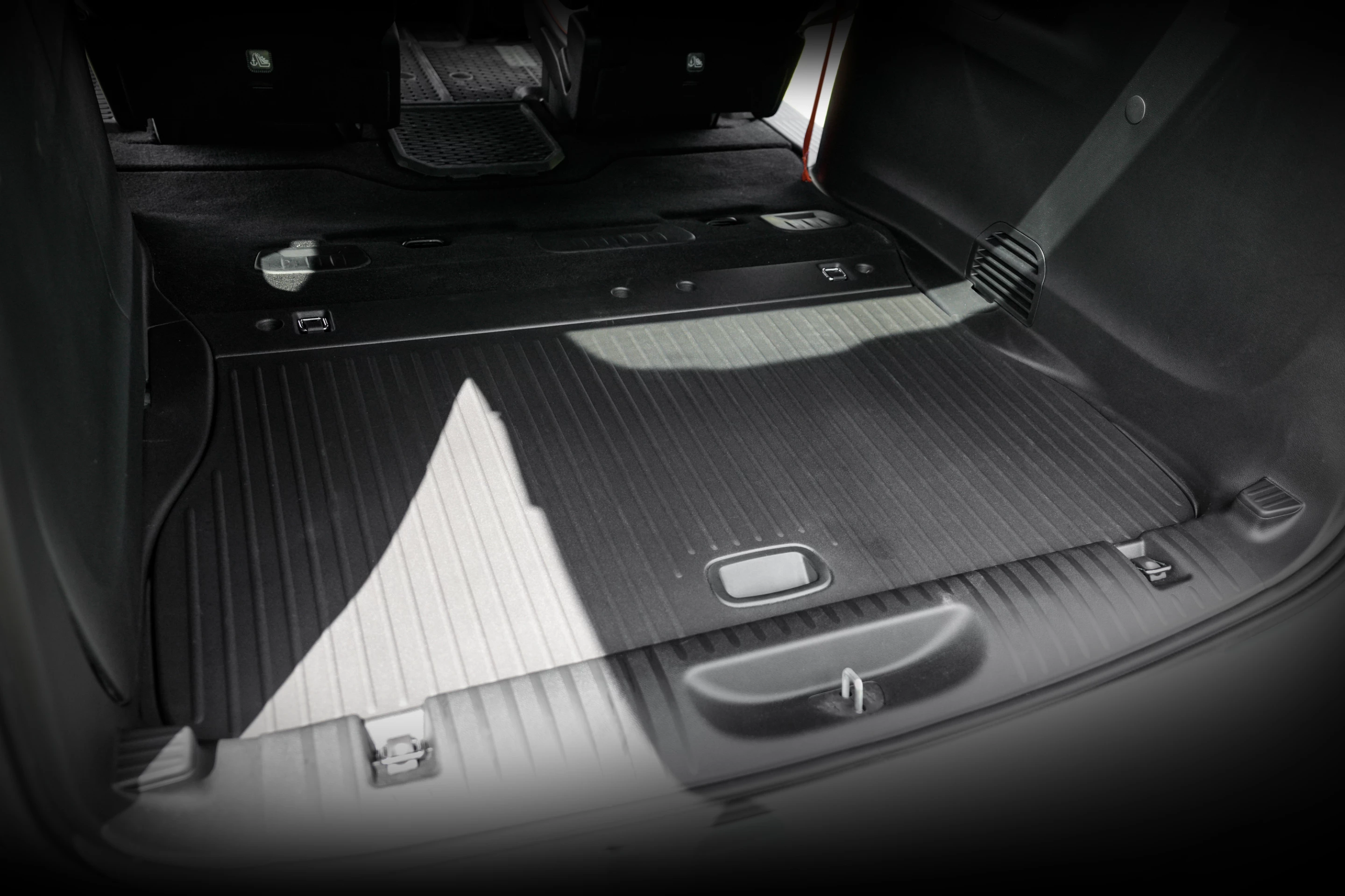 Chrysler replaces the third-row seats with concept cargo floor panels that increase cargo/sleeping area