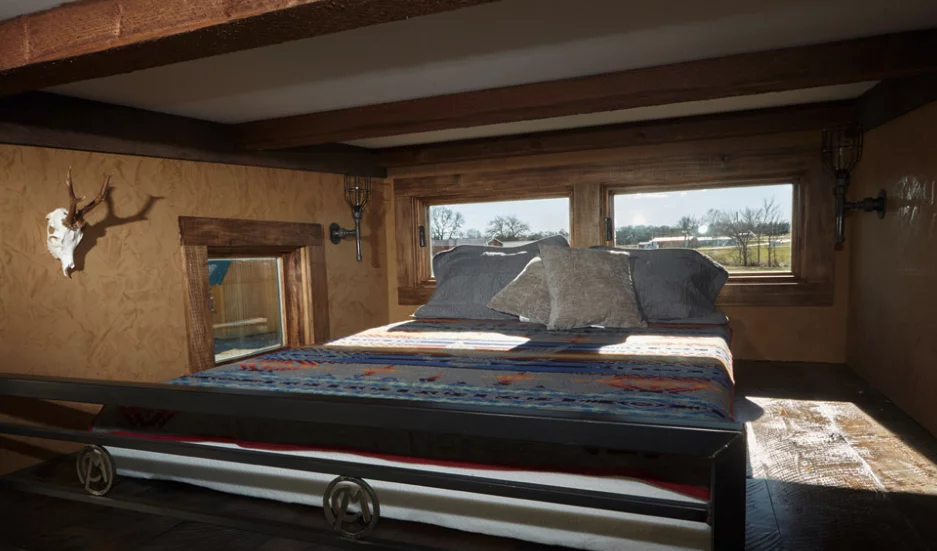 The snug upstairs sleeping loft