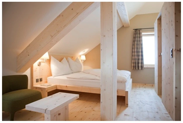 The Romantik Hotel Muottas Muragl offers guests luxury Swiss stone pine accommodation (image: Romantik Hotel)