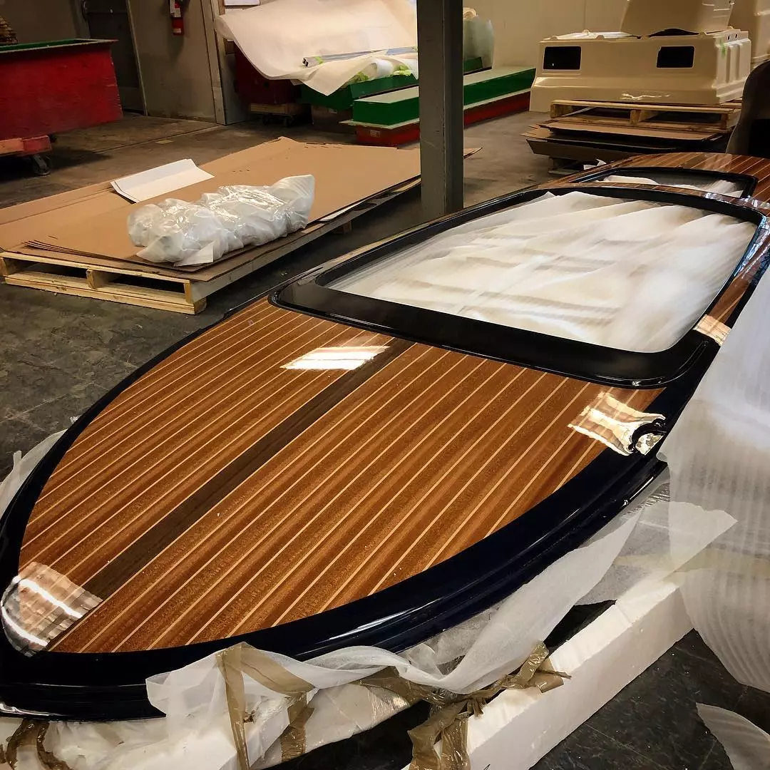 Tahoe features a lightweight molded fiberglass hull with infused real wood