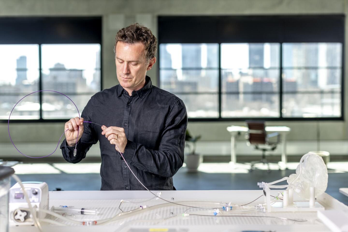 Synchron's Thomas Oxley shows how the Stentrode is inserted using a standard cathether through the jugular vein