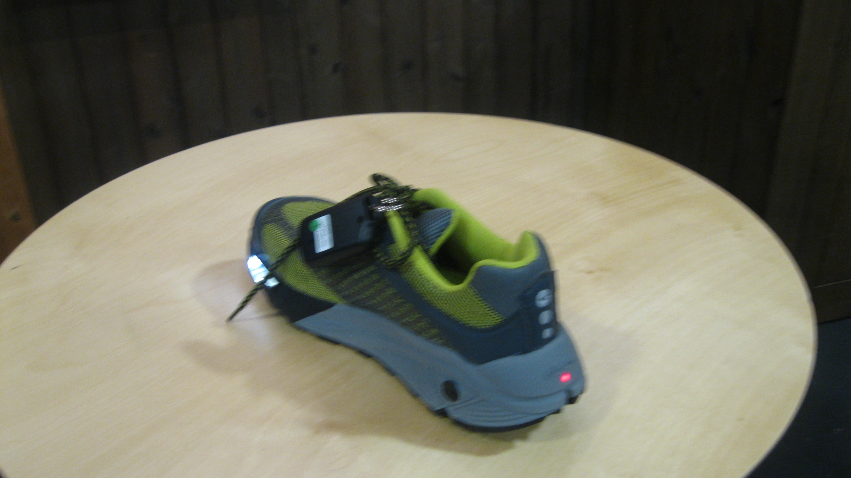 The sole includes a red tail light for rear visibility