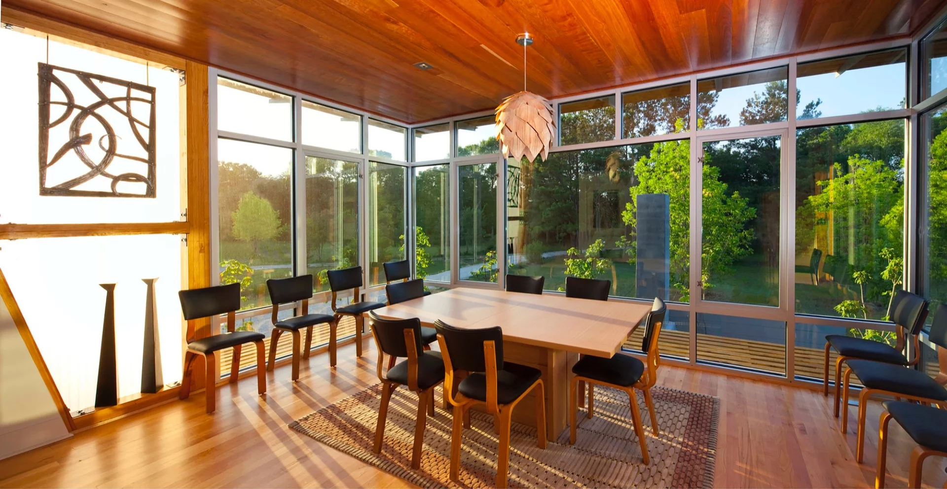 The first floor features a living room, main kitchen, and dining room