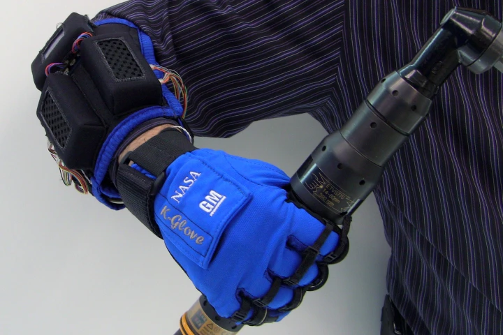 NASA and GM engineers have created Robo-Glove, a power-assisted glove designed to keep astronauts and autoworkers from getting repetitive stress injuries