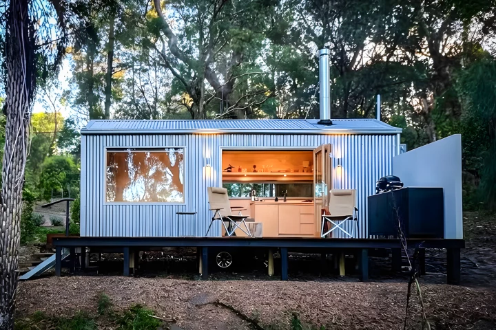 The Zinc Studio Cabin features a corrugated metal exterior that's inspired by agricultural sheds