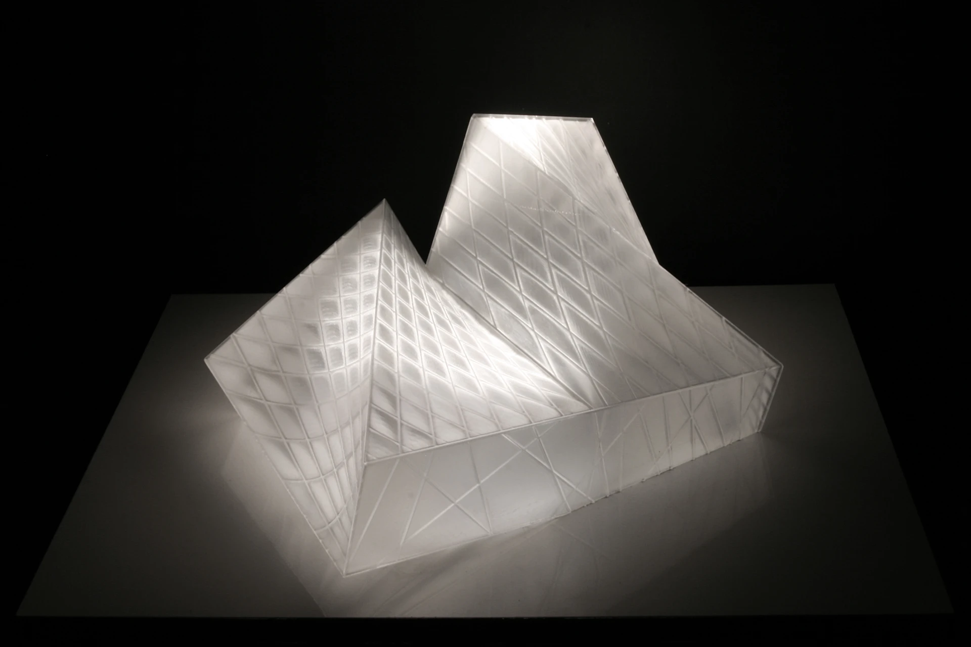 The building's distinctive diamond form derives from three different geometric shapes that fuse together to become one (Image: GRAFT)