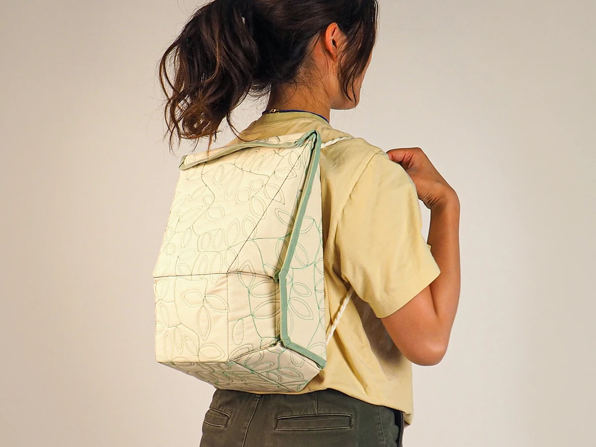Beyond the furniture showcased in this work, the backpack (right) looks especially distinctive