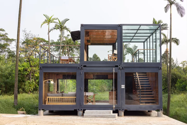 A Work of Substance architectural studio has recently transformed four shipping containers into a stunning two-story office suite