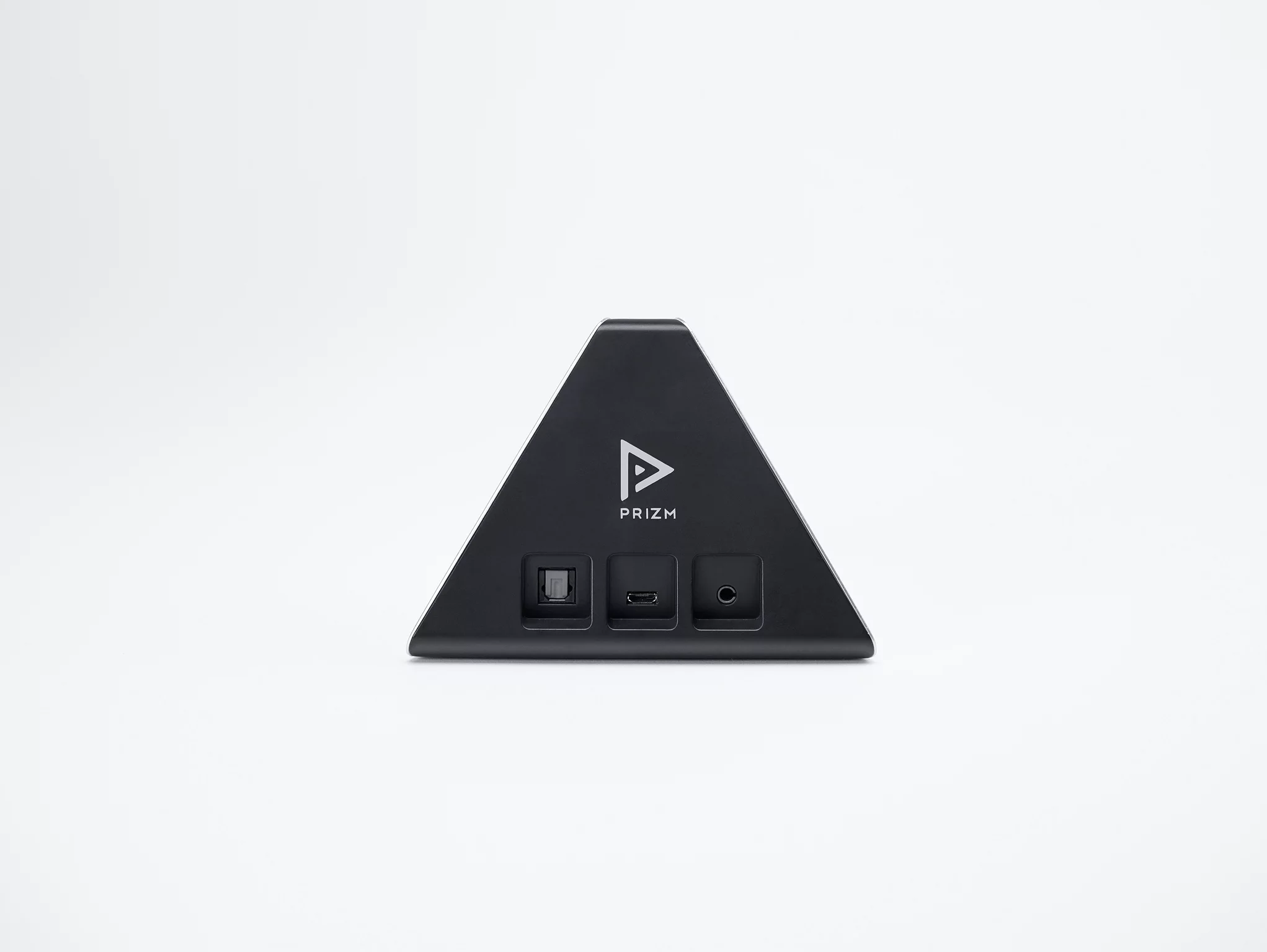 Speakers and power are connected to the rear of the Prizm unit