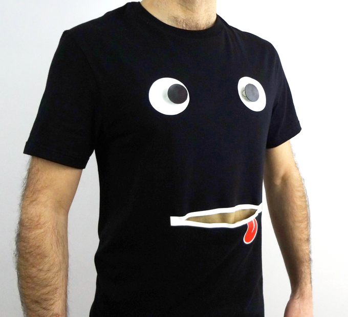 The BarfSuit looks like just a big dopey face, but it's made to hold sick bags