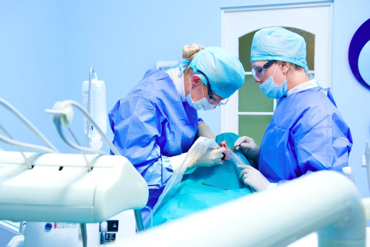 A dental implantation procedure being performed