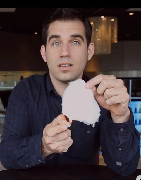 Eurakite CEO/CTO demonstrates that, despite having the appearance of paper, the new flexible ceramic does not burn