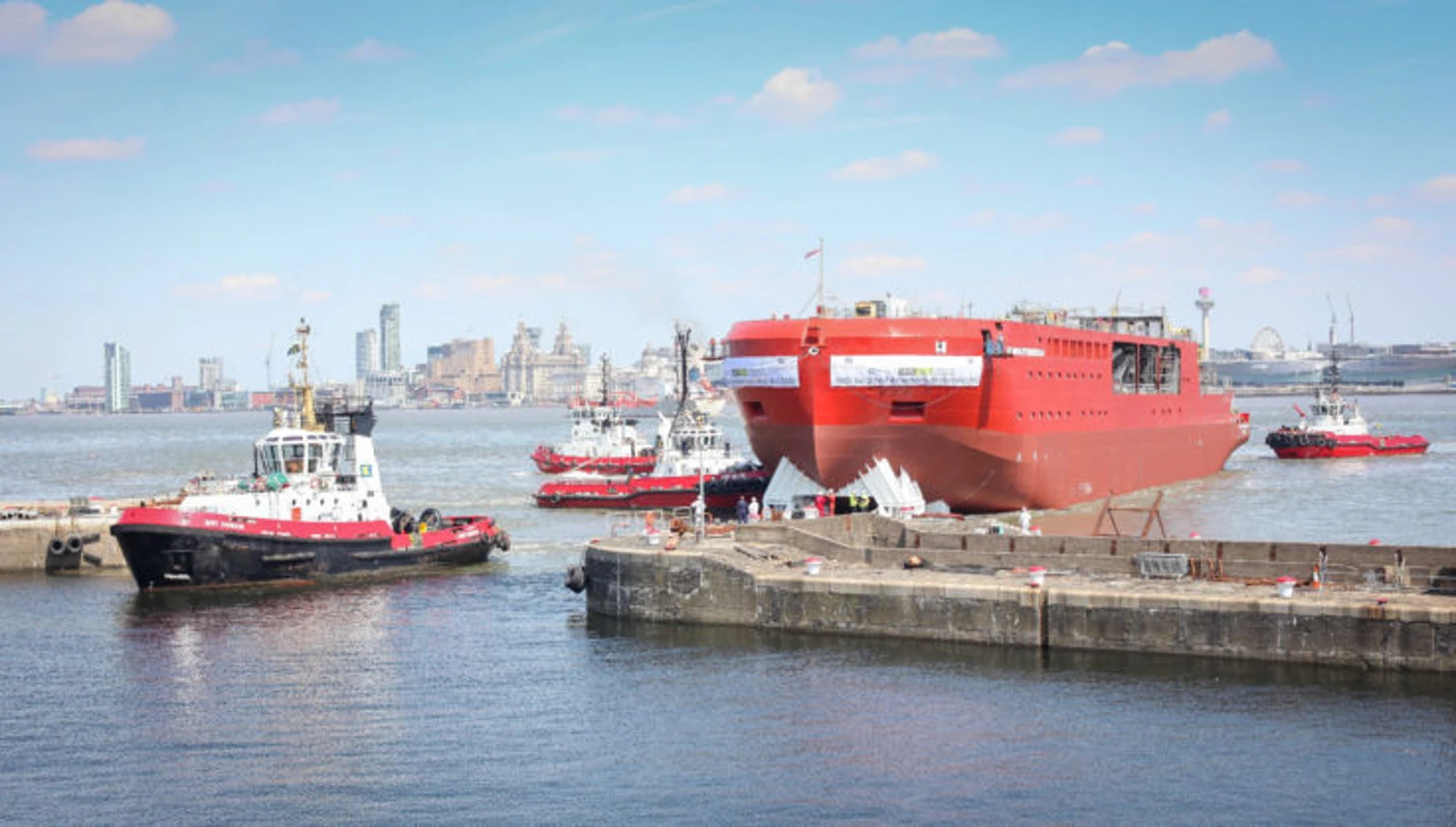 RSS Sir David Attenborough being warped to its new berth
