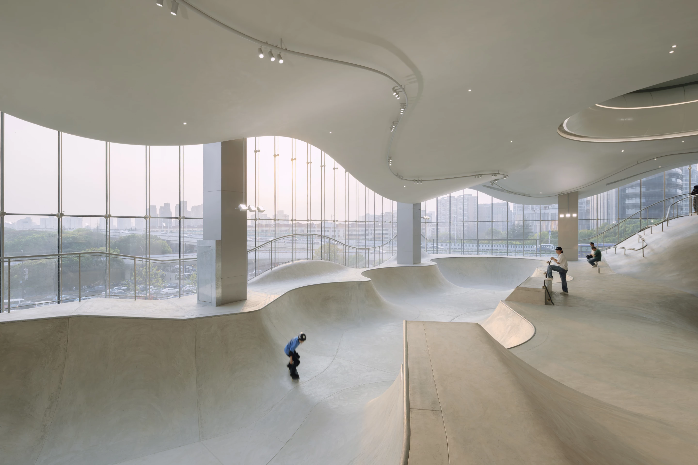 MOREPRK Skyline, by AAN Architects, is located in China and creates an indoor skate park high above the city streets
