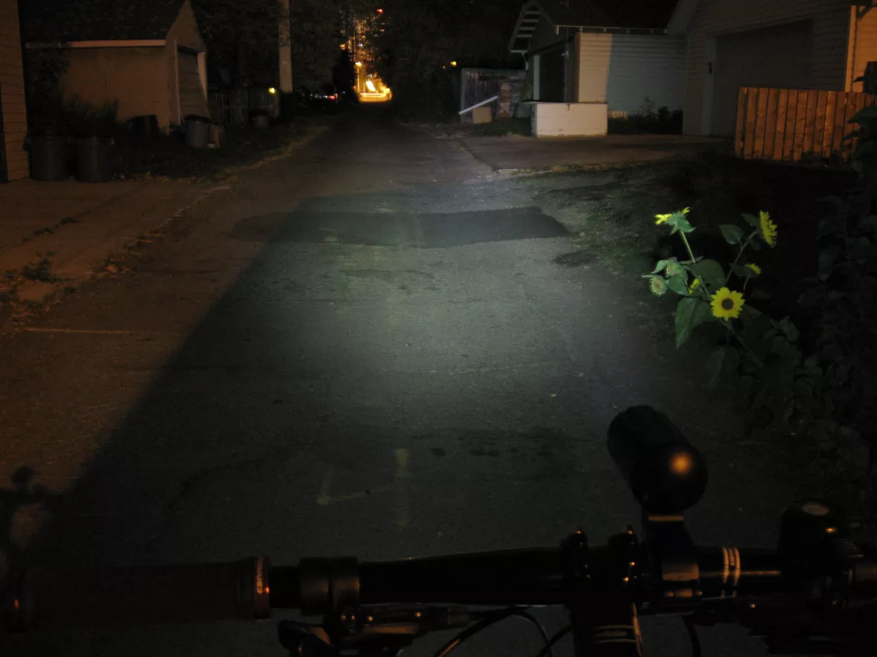 The Defender's spotlight is adequate for lit roads, but perhaps a little weak to be your one and only source of road illumination