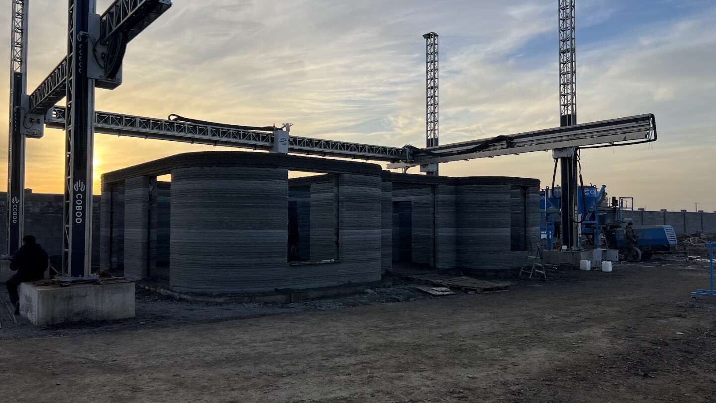 The 3D-printed house's walls were completed in just five days, but then human builders came in to add windows, doors and anything else needed