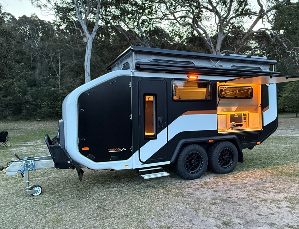 Sleek, ultramodern glamper pod makes a cushy ebike-stowing base camp