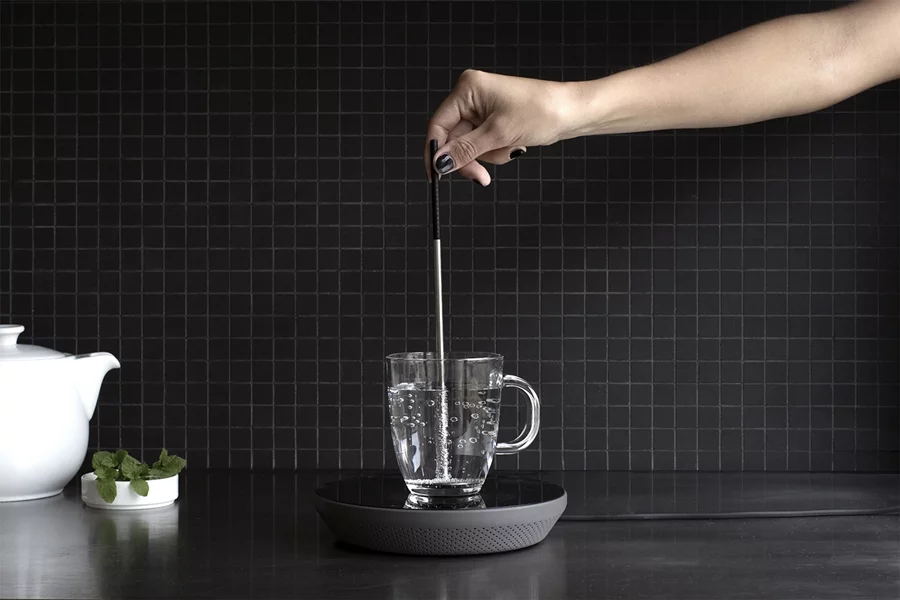 When a vessel of liquid is placed upon the base of the Miito with the rod inside it, an electromagnetic current is induced in the rod (Photo: Miito)