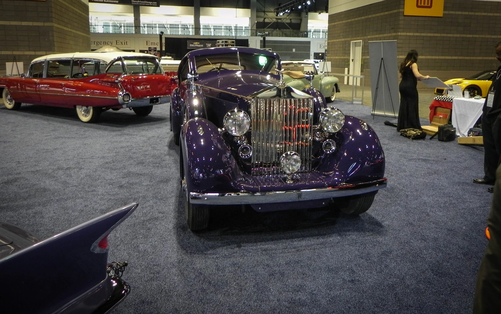 Showcases of old cars are also on display at the Chicago Auto Show, including this beautiful Rolls Royce and the unusual '59 Cadillac Broadmoor Skyview behind it