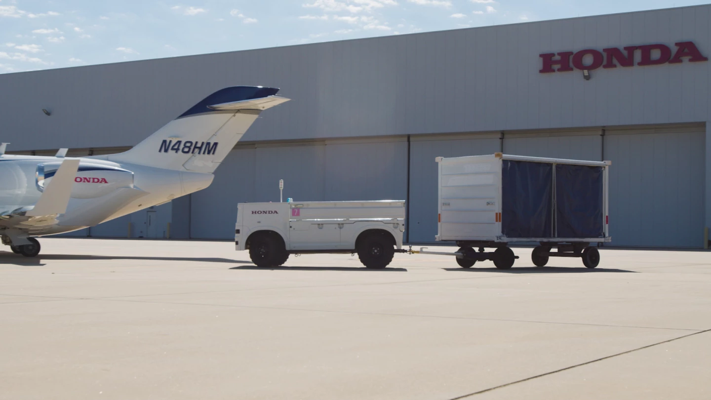 The Autonomous Work Vehicle could tow baggage carts to and from aircraft